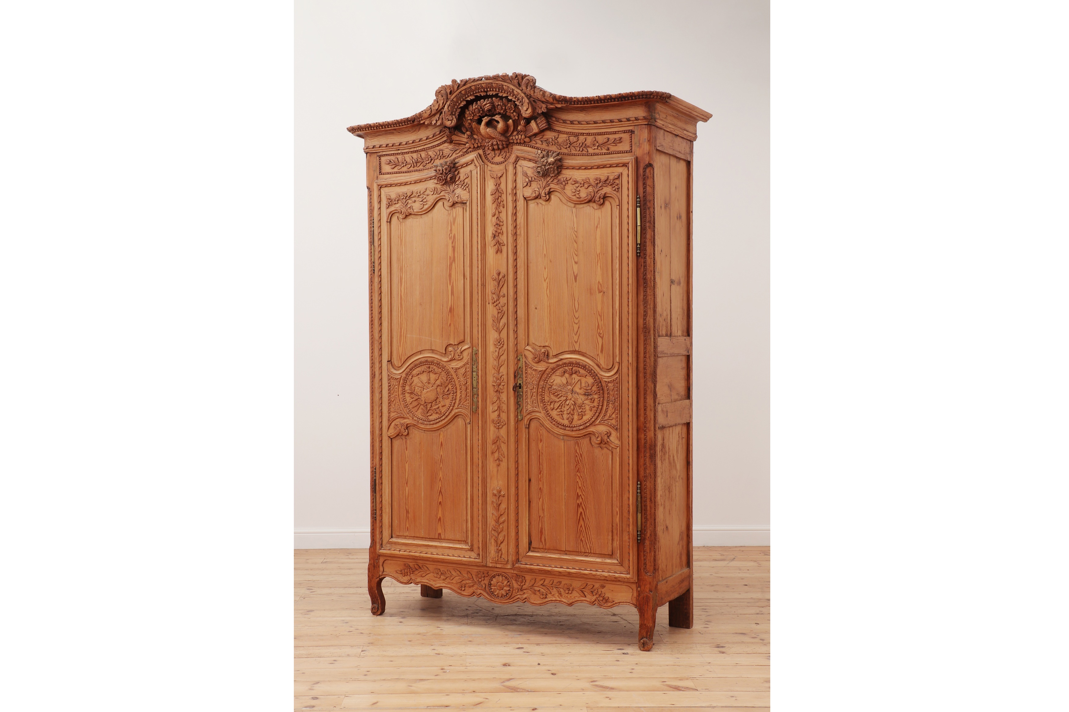 A Louis XVI pine armoire